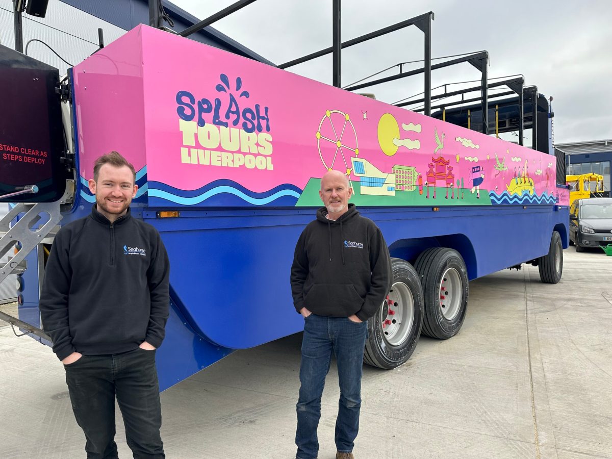 a man standing in front of a truck