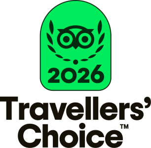 Green badge with owl logo, laurel, '2026' above 'Travellers' Choice' text.